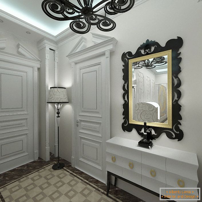 Арт деко стил харесва светли нюанси в интериора. Входът, декориран в бяло, е забележим за правилно избрани контрастни декоративни елементи.