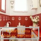 Романтичен стил в дизайна на червената и бялата тоалетна