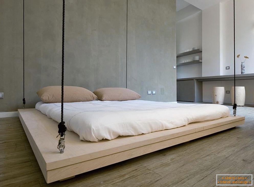 Интериорът на спалнята в стила на минимализма
