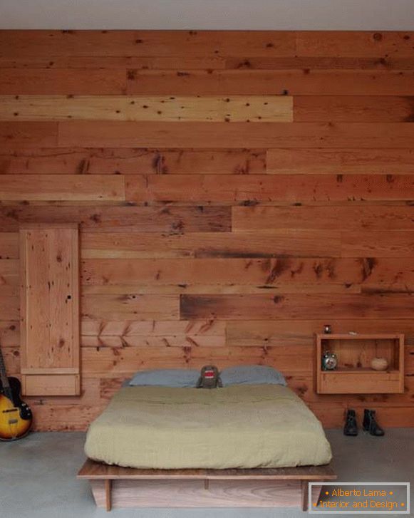 Спалня в минималистичен стил, украсена с дърво