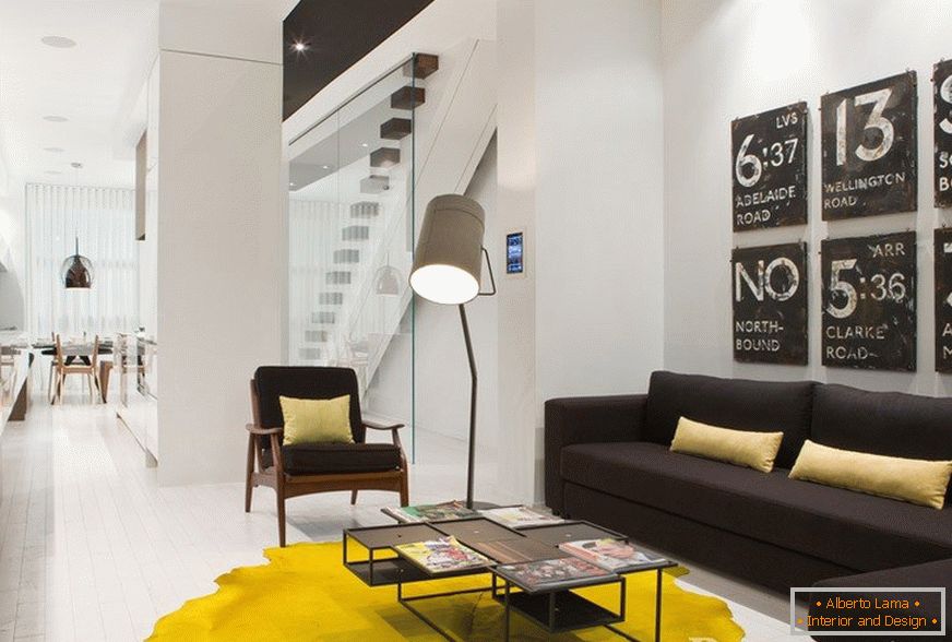 Ярко жълтият килим ще даде дизайн на стая на радост