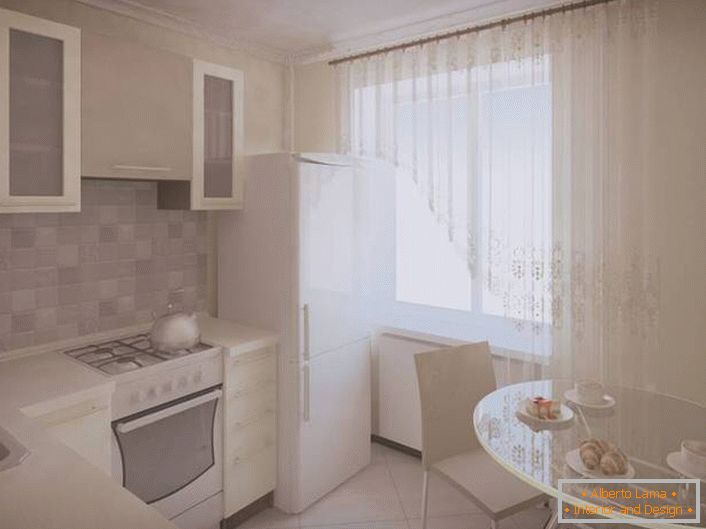 Малкото кухненско пространство може да бъде визуално разширено, като се използва изключително бяло за декорация. 
