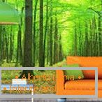 Оранжев диван на зелен горски фон