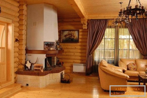 Модерен интериор на дървена къща от дървени трупи - снимка