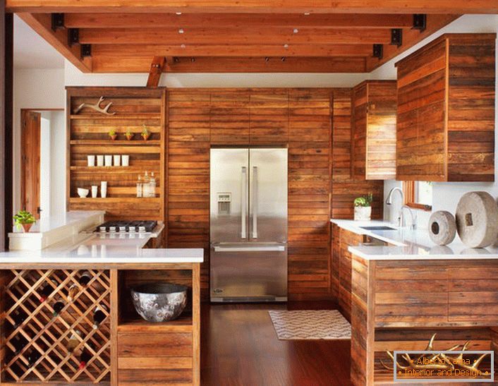 Модерният кухненски стил в кухнята се отличава със своята лаконична декорация с нисък ключ. Комплектът дърво без допълнителни мебели изглежда стилен и ефективен.