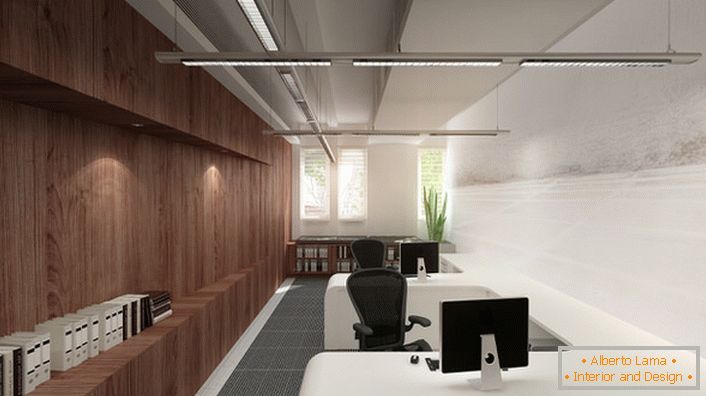 Работните зони в офиса са осветени от интелигентни LED светлини, които поддържат зададените параметри.