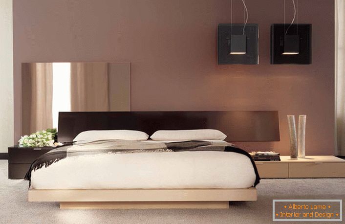 Минималистичен дизайн с нотки на японски цвят в спалнята на обикновен френски апартамент. 